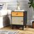 Boho Rattan éjjeliszekrény tömör fa lábakkal - fekete